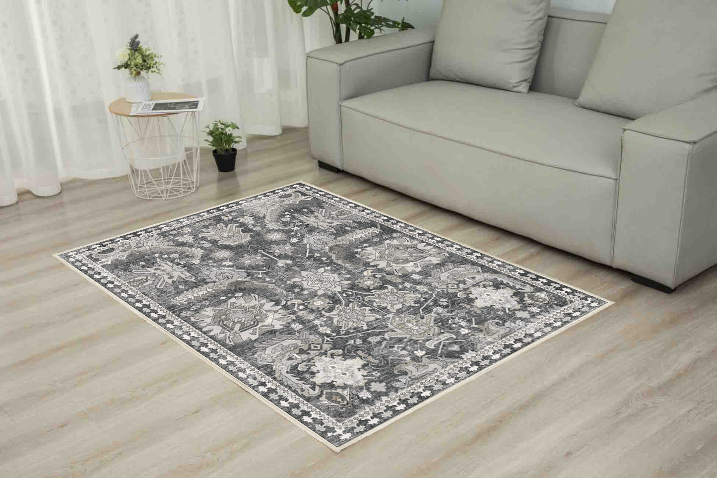 Horizon Charcoal Damask rug in a living room