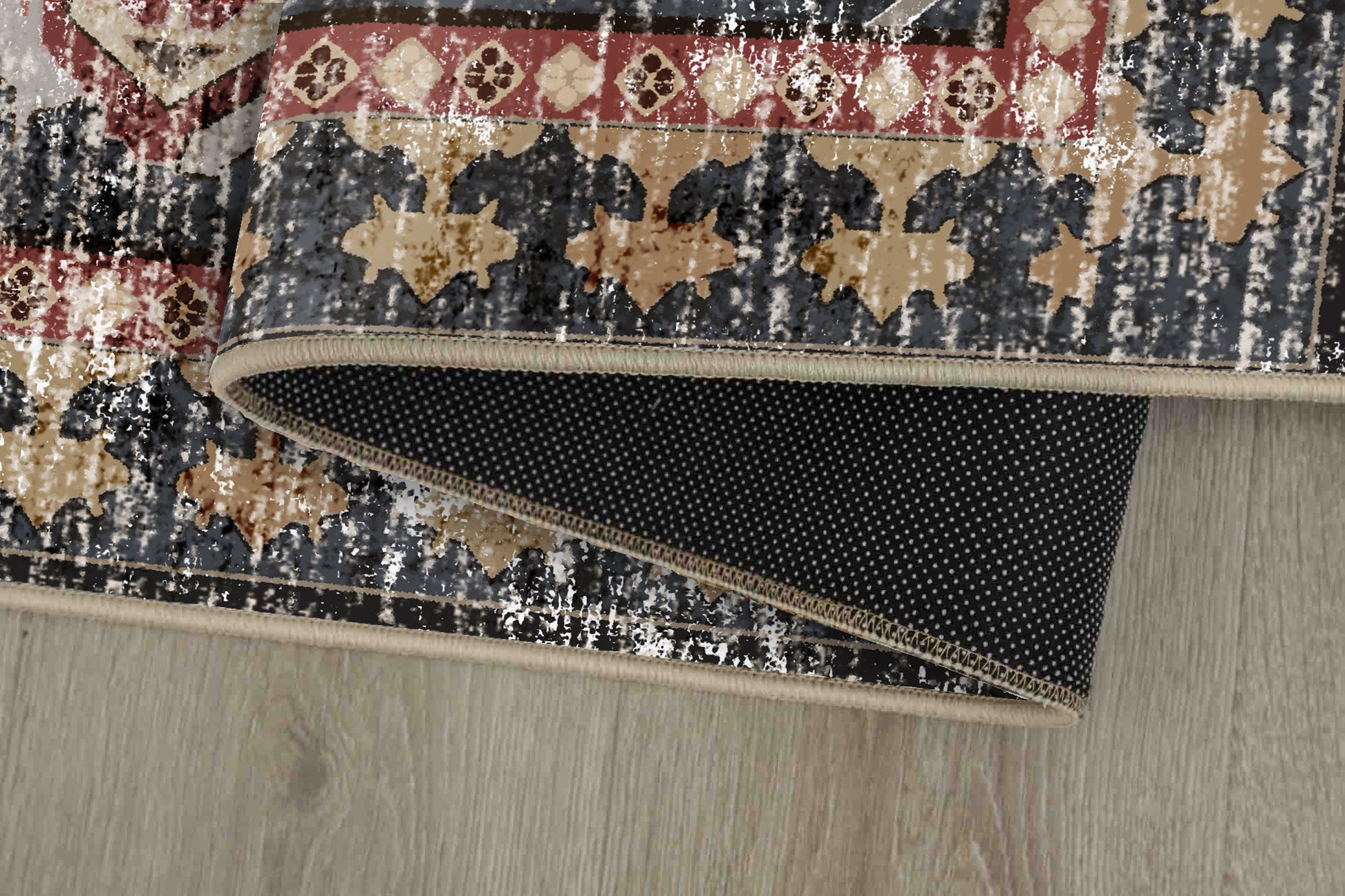 Horizon Dusty Rose rug corner folded, showing the non-slip dot backing