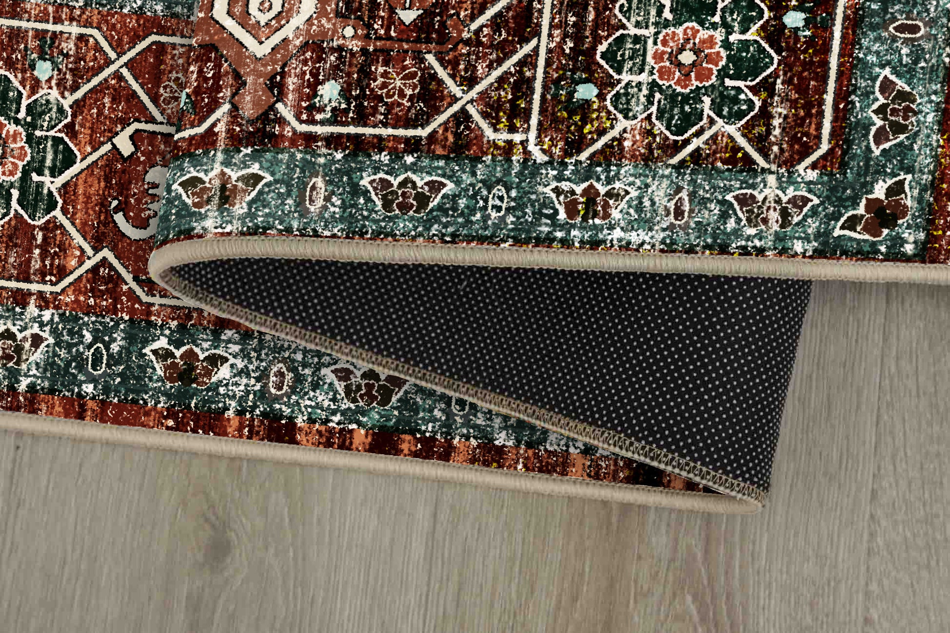 Horizon Copper Medallion rug corner folded, showing the non-slip dot backing