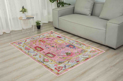 Horizon Pink Oushak rug in a living room