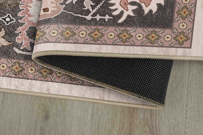 Sabrina Garden Bloom rug corner folded, showing the non-slip dot backing