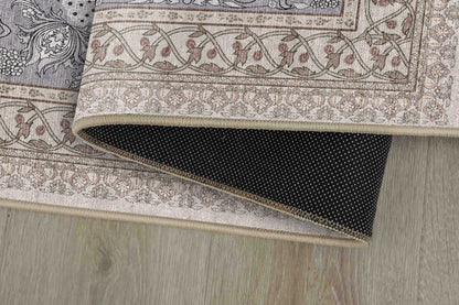 Sabrina Silver Classic rug corner folded, showing the non-slip dot backing