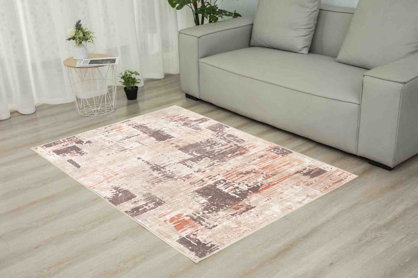 Torino Abstract Terracotta rug in a living room
