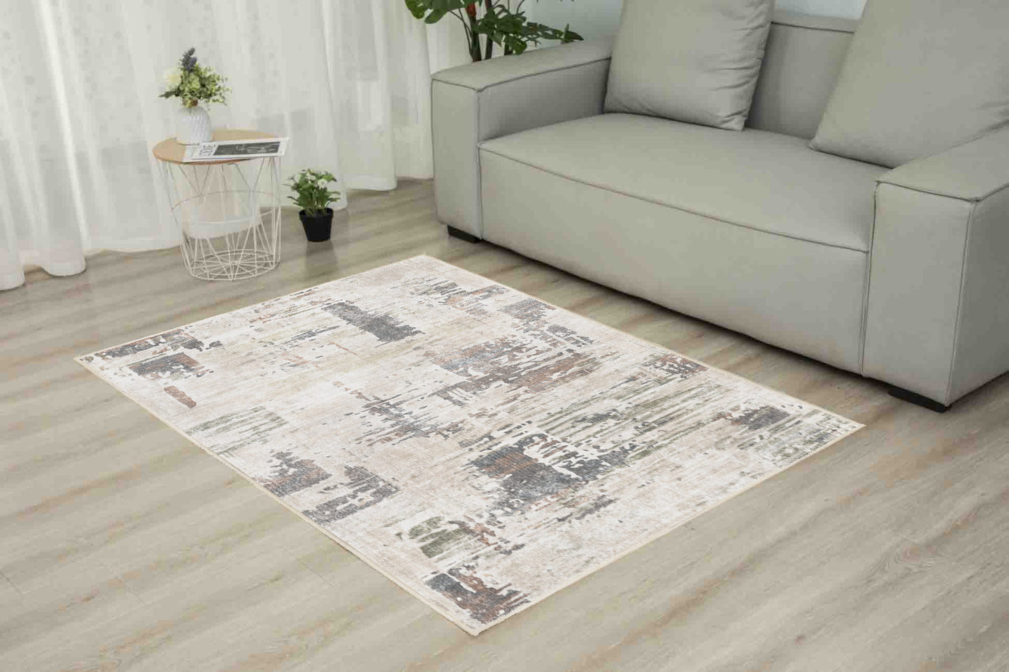 Torino Abstract Sage rug in a living room