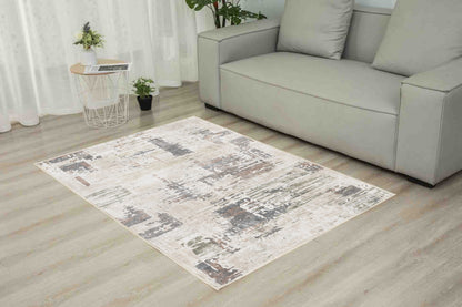Torino Abstract Sage rug in a living room